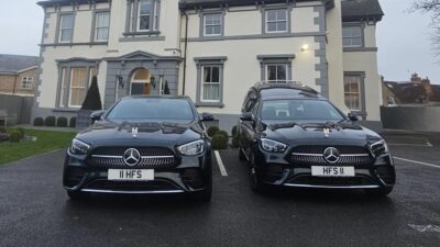 Mercedes emerald green hearse and limousine front