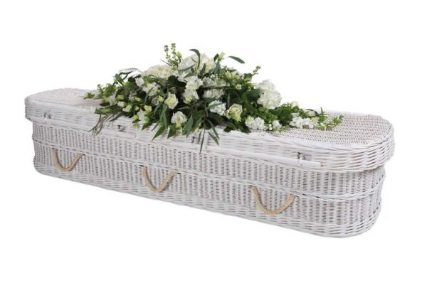 White wicker rounded coffin